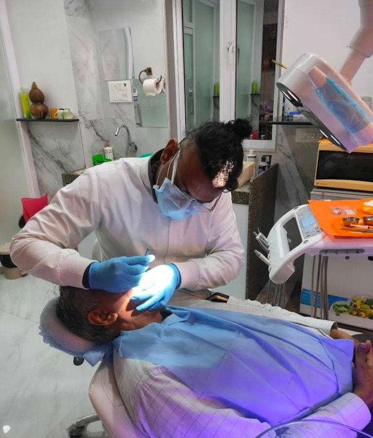 Treatment in progress at the dental chair